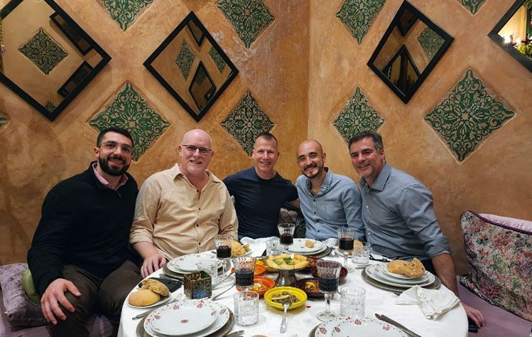 the author with a group of fellow researchers after the conference